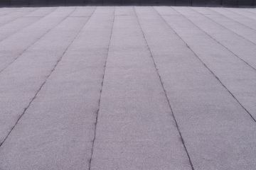 Flat roof in Cornell by M & M Developers Inc.
